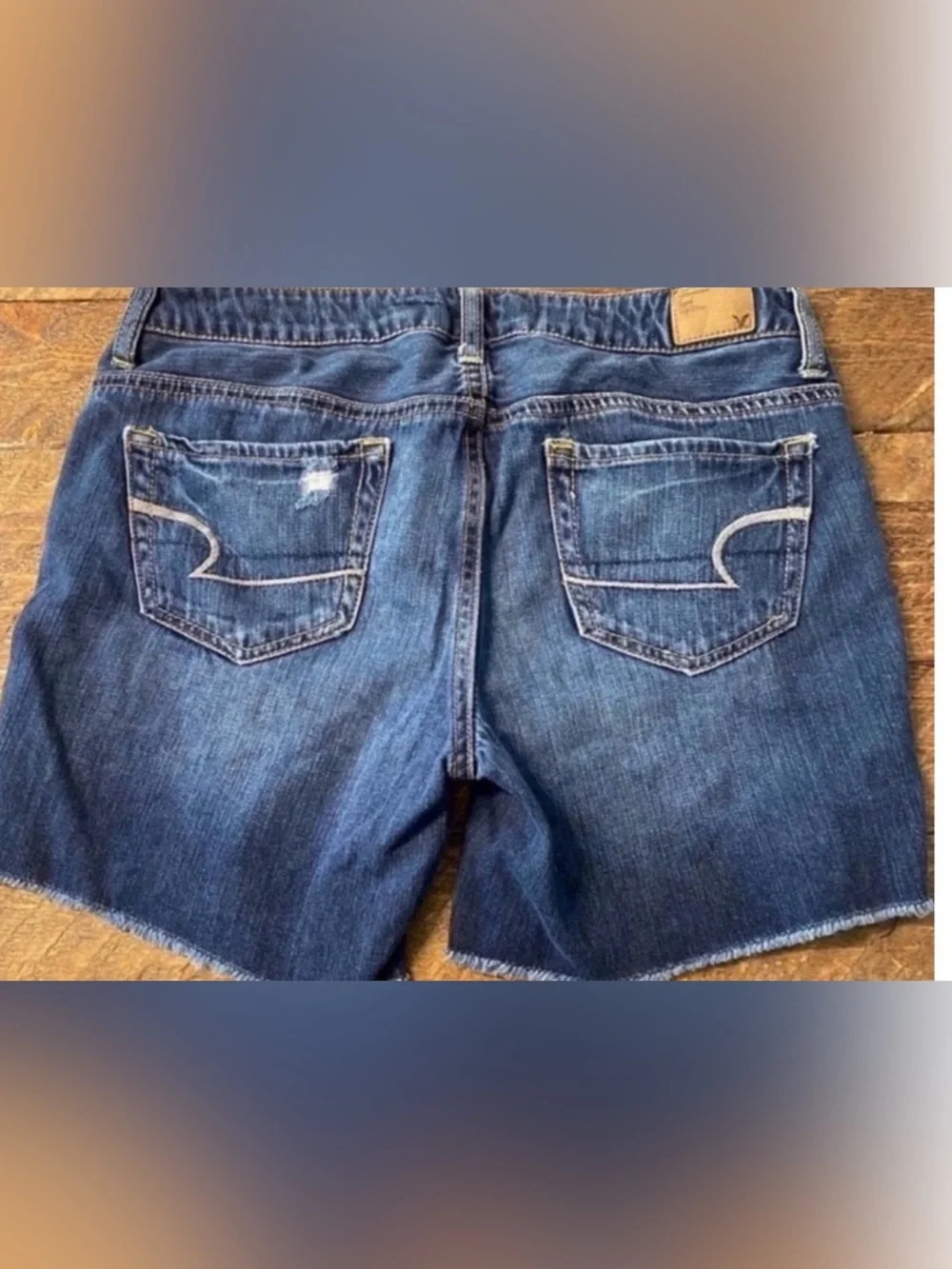 American Eagle Outfitters Women's Dark Blue Distressed Denim Shorts (Size 4)